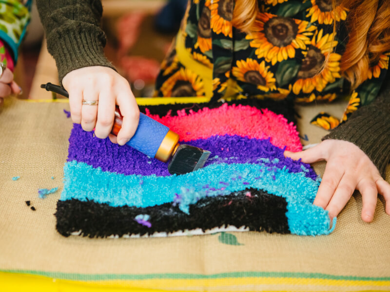 Rug tufting in process